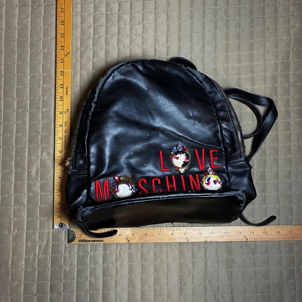 Love‎ Moschino Black Faux Leather Backpack Jeweled Patches Red Logo AS IS Repair